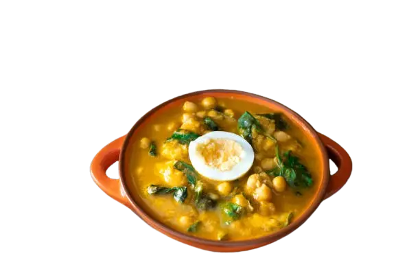 Cuenco de barro de potaje de garbanzos con espinacas